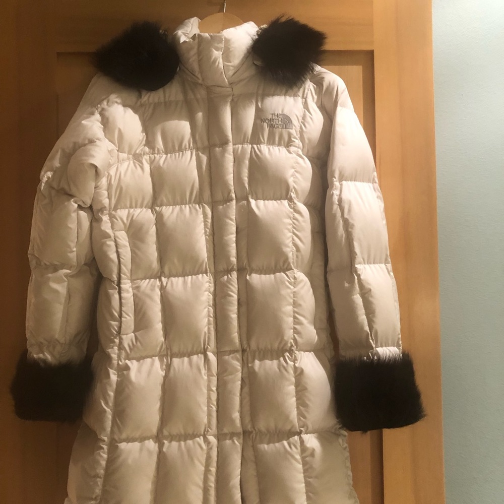 North face down knee length, size small winter coat.
